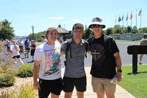 three people smiling